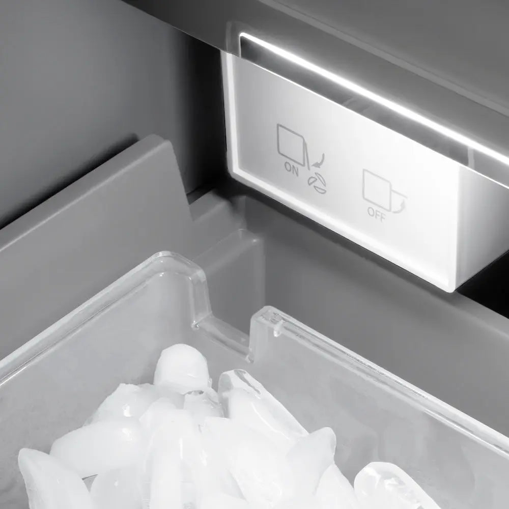 https://cdn.shopify.com/s/files/1/0596/2504/6223/files/zline--built--in--black--stainless--steel--column--freezer--RCFVLZ-BS-18-CB--detail--ice--maker--ice.jpg?v=1750090159