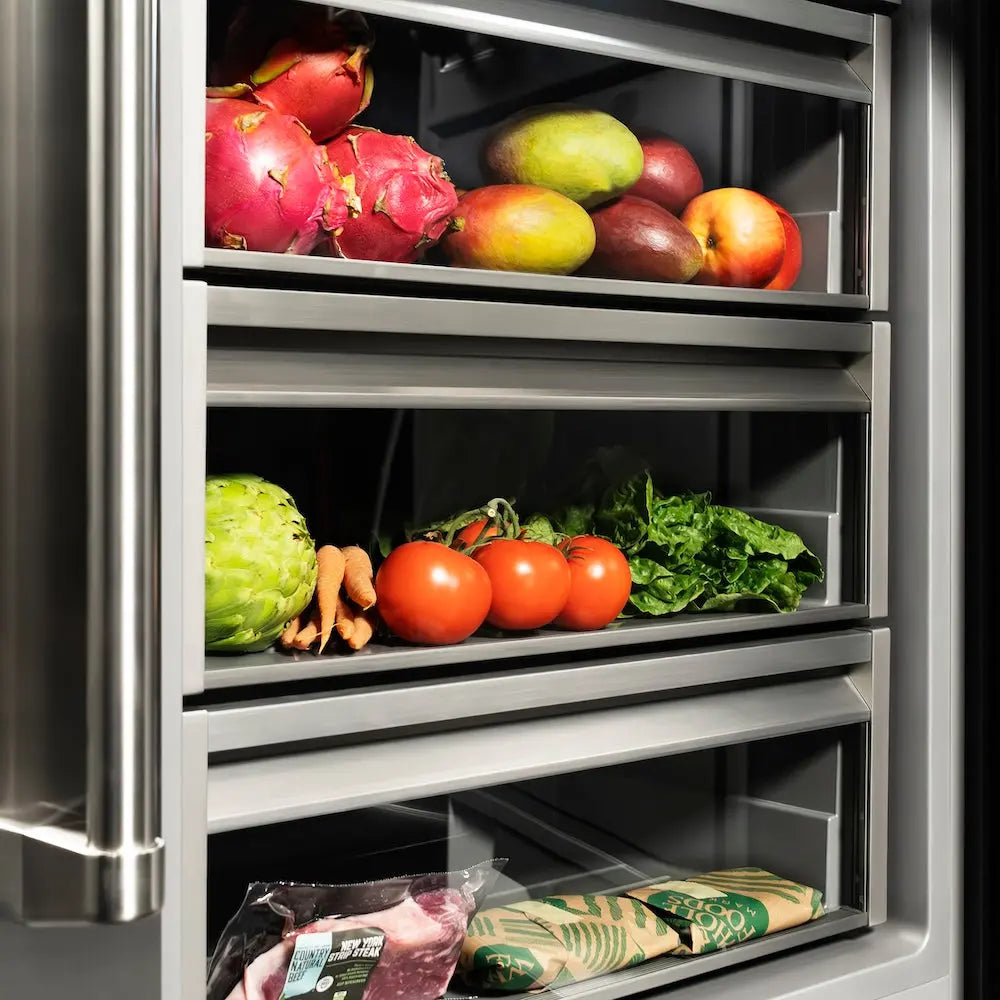 https://cdn.shopify.com/s/files/1/0596/2504/6223/files/zline--built--in--satin--stainless--steel--column--refrigerator--RCRVZ-SN-24-MB--detail--drawers--food.jpg?v=1749845609